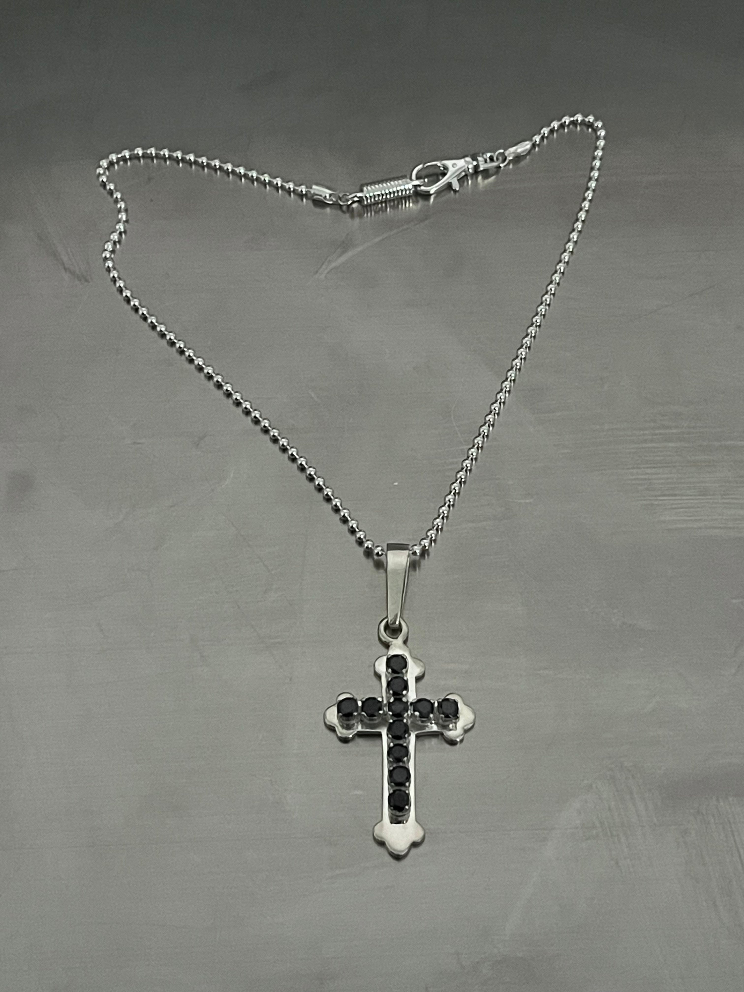 ONYX RUI CROSS PENDANT
