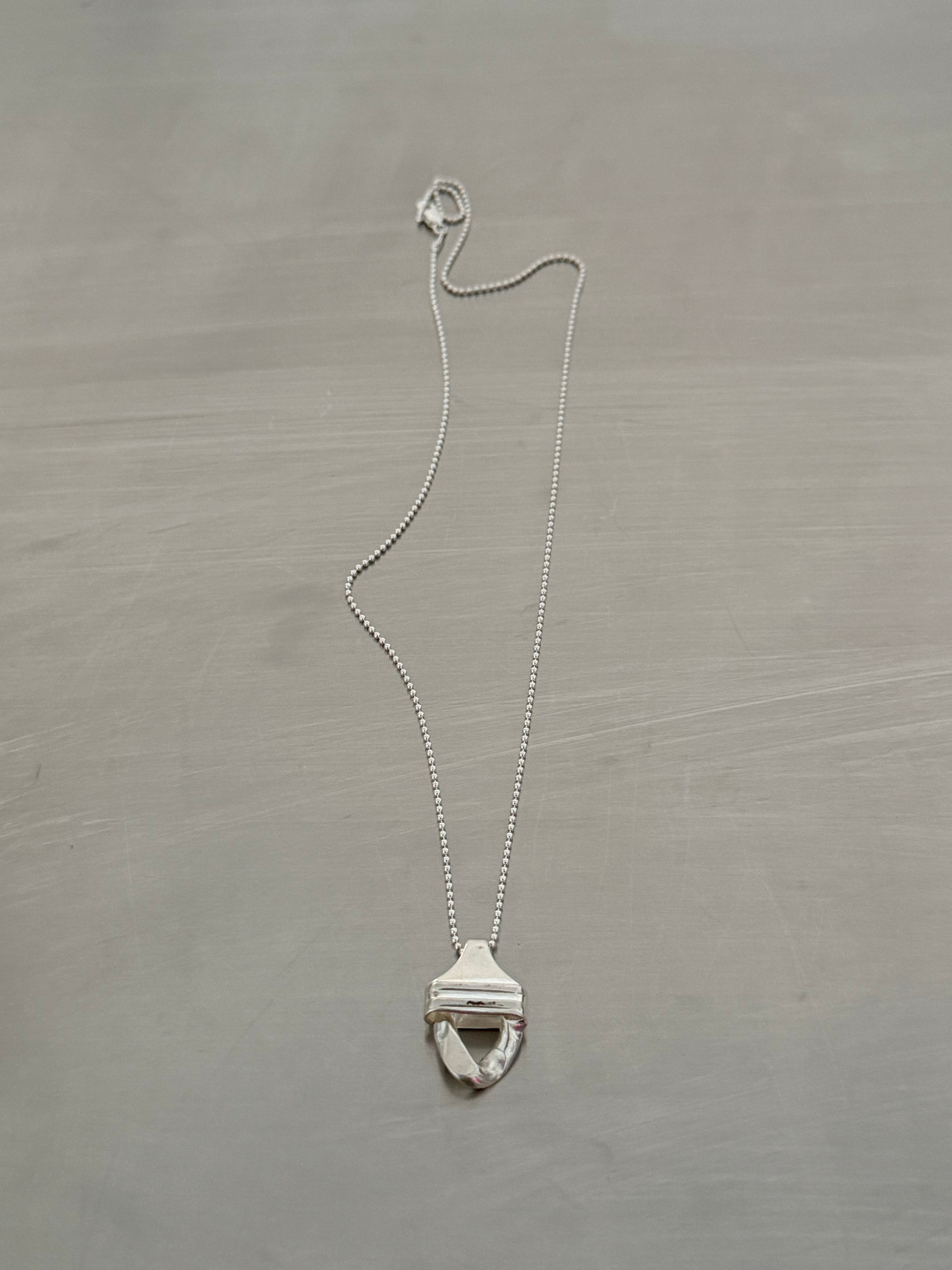 QIL CHARM NECKLACE