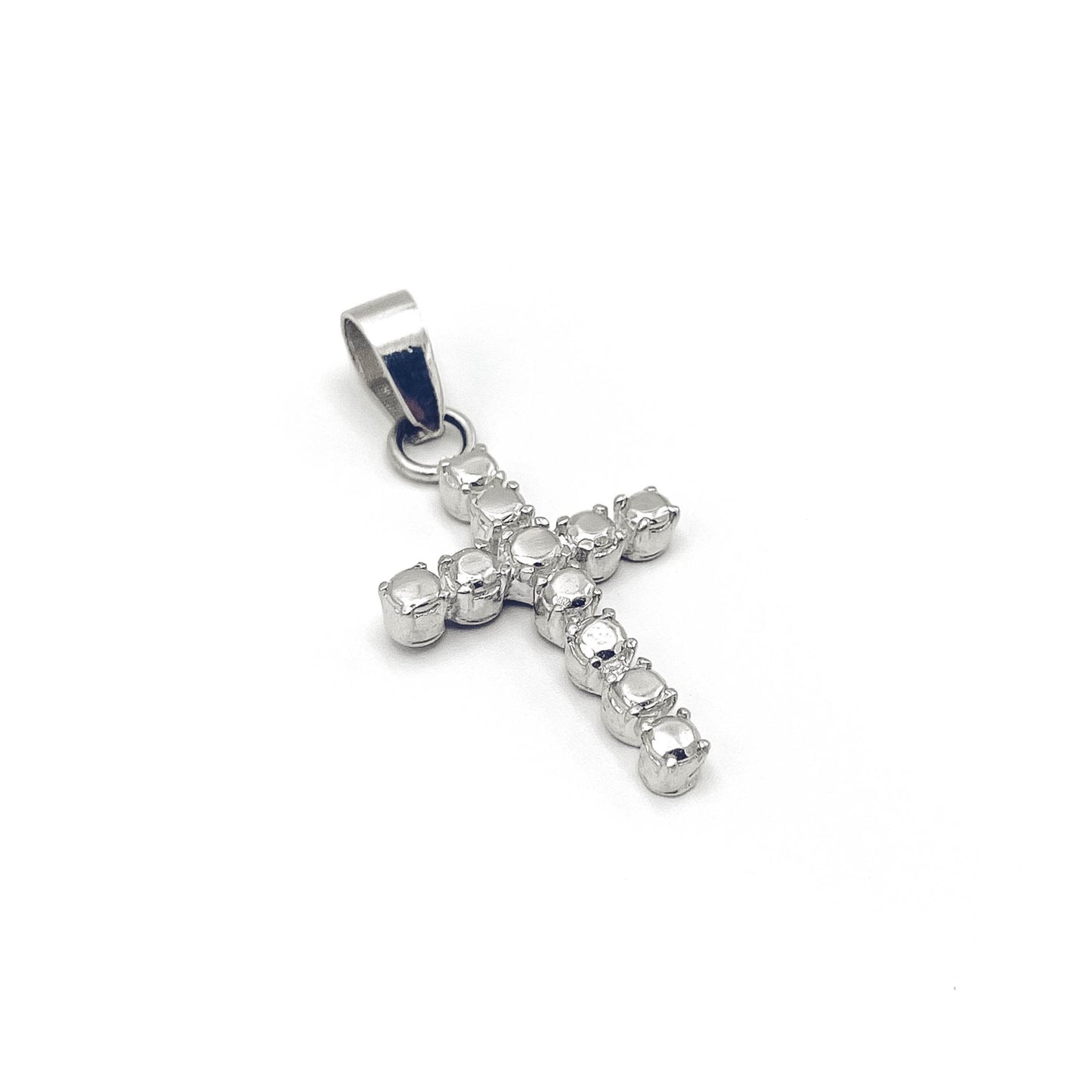 Sterling silver cross pendant with stone detail .