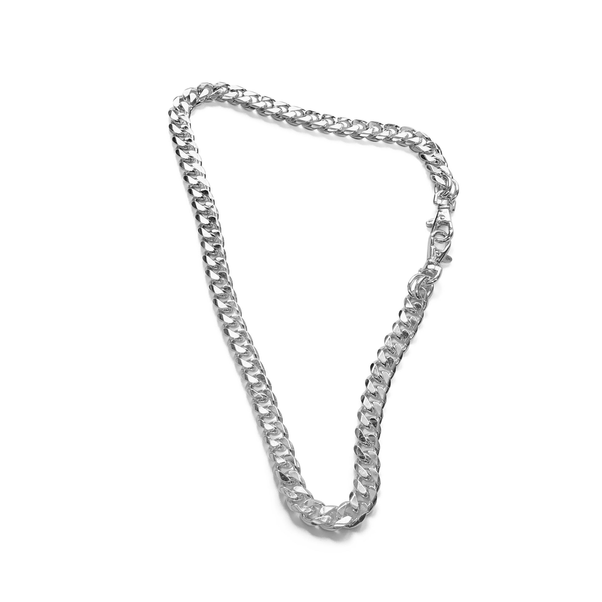 Silver chain necklace on a white background