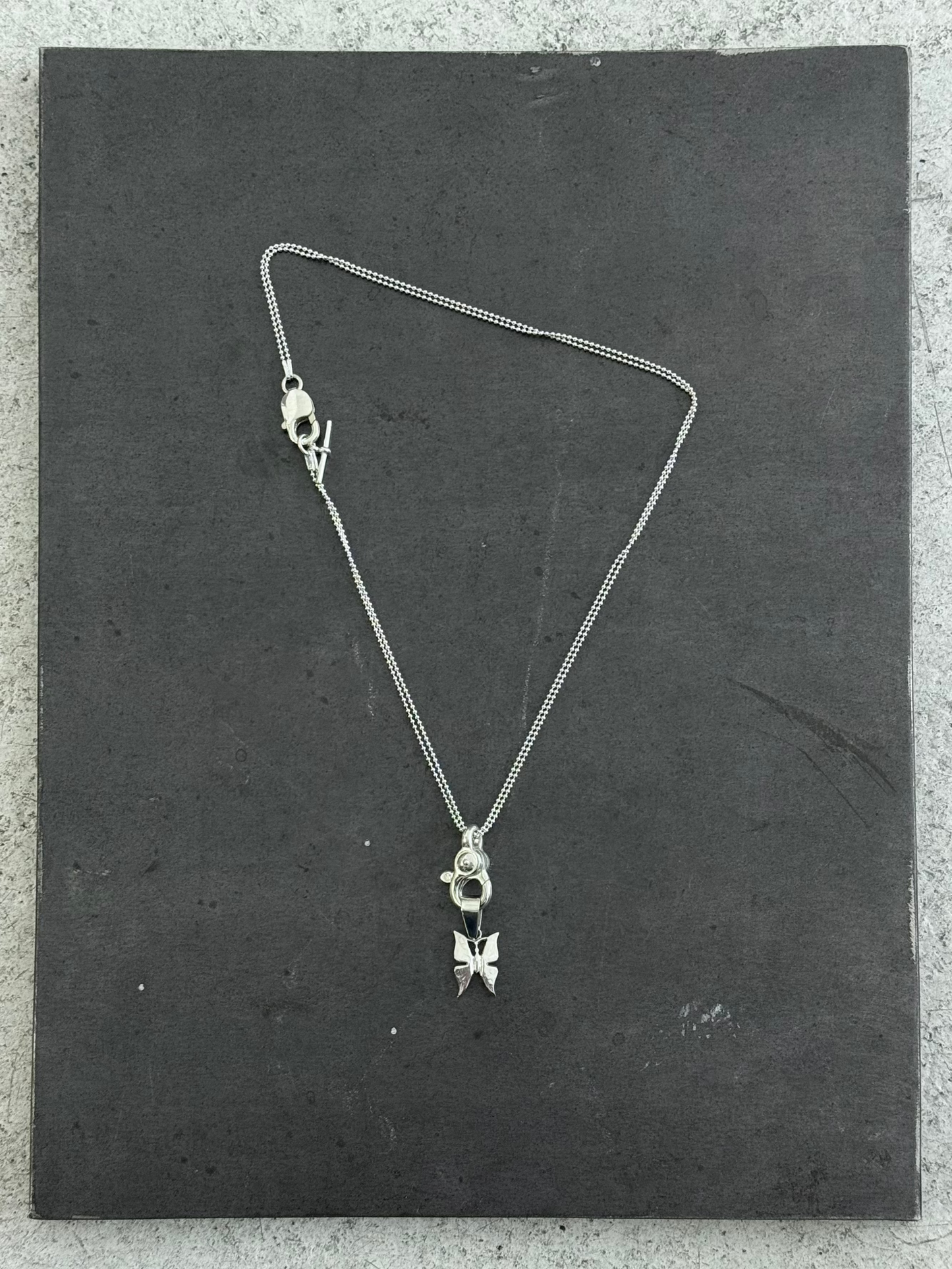 TRIGGER ATTACHMENT CHAIN