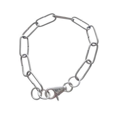 Silver chain bracelet on a white background