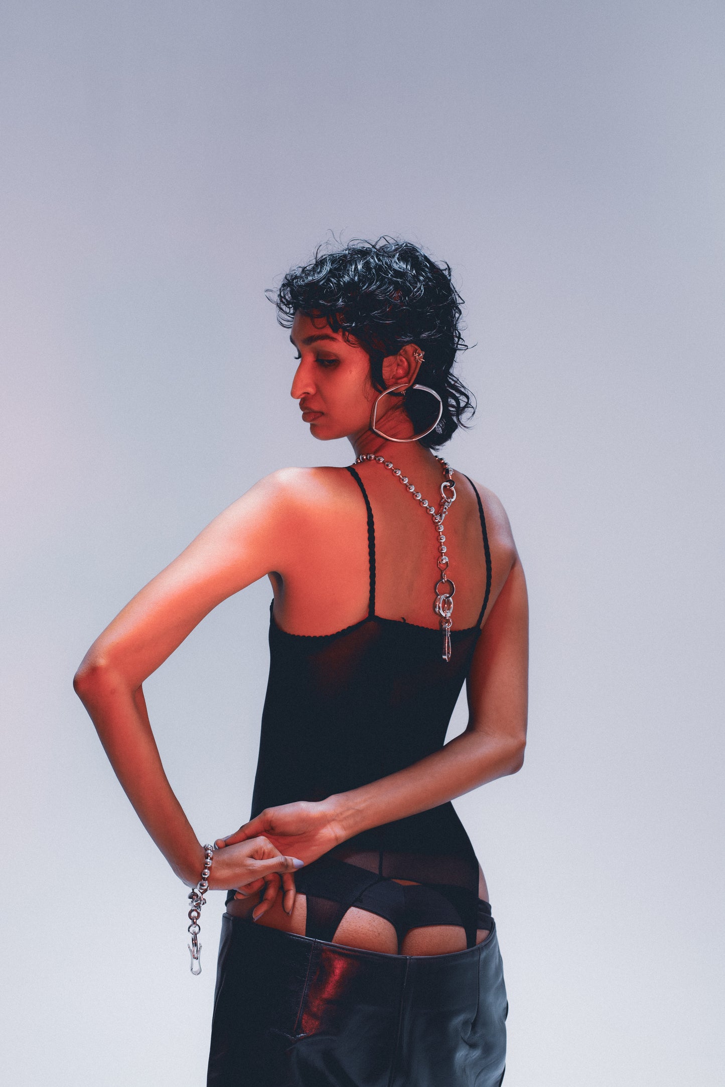 Bold extendable ball chain keychain; modular design . On model Back