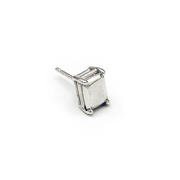 Geometric box-shaped stud earrings in silver .