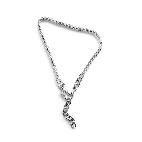 Silver chain bracelet on a white background