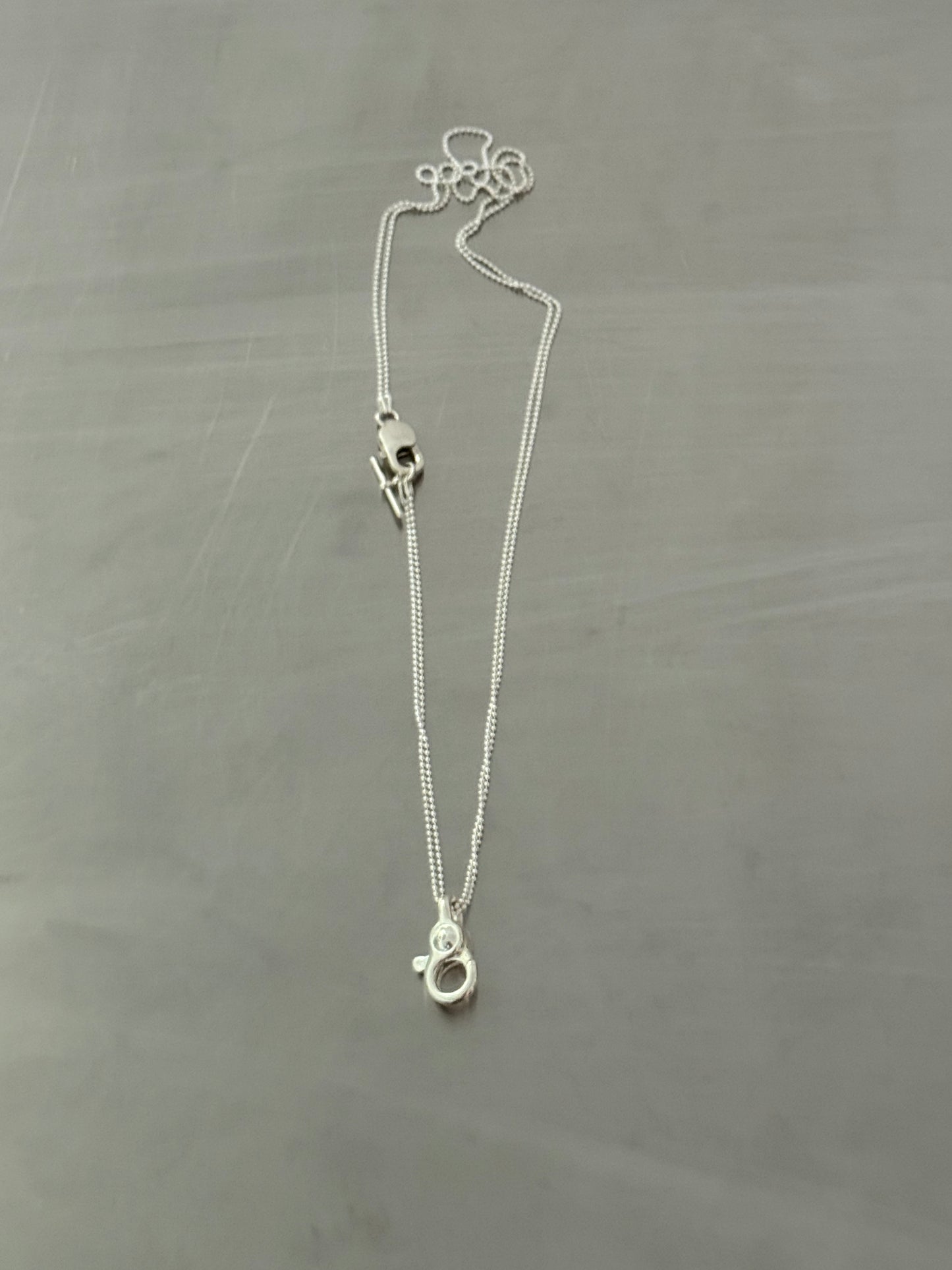 TRIGGER ATTACHMENT CHAIN