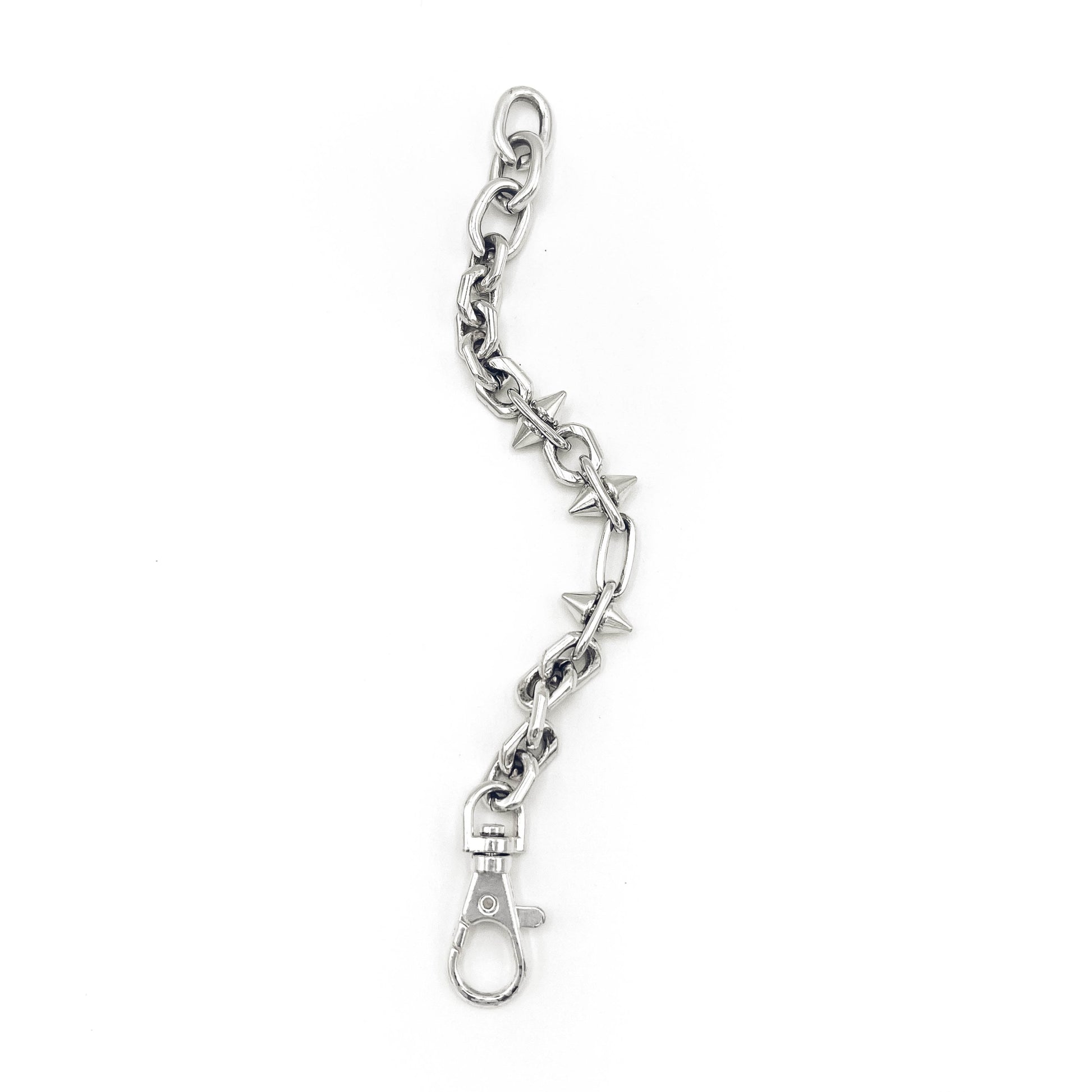 Edgy spike-accented chain bracelet; heirloom silver. FLATS