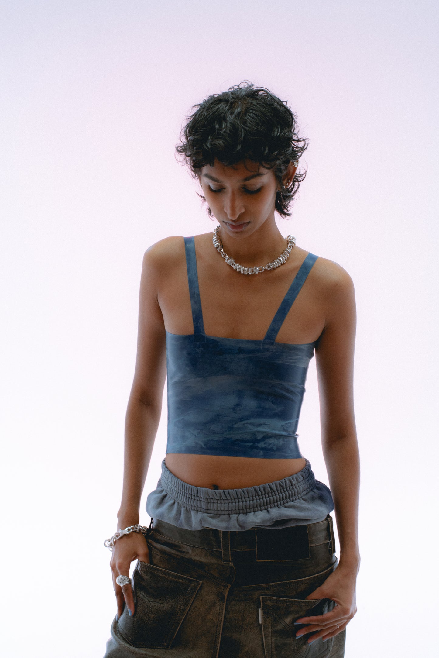 Chunky open-link chain design in heirloom silver . on model