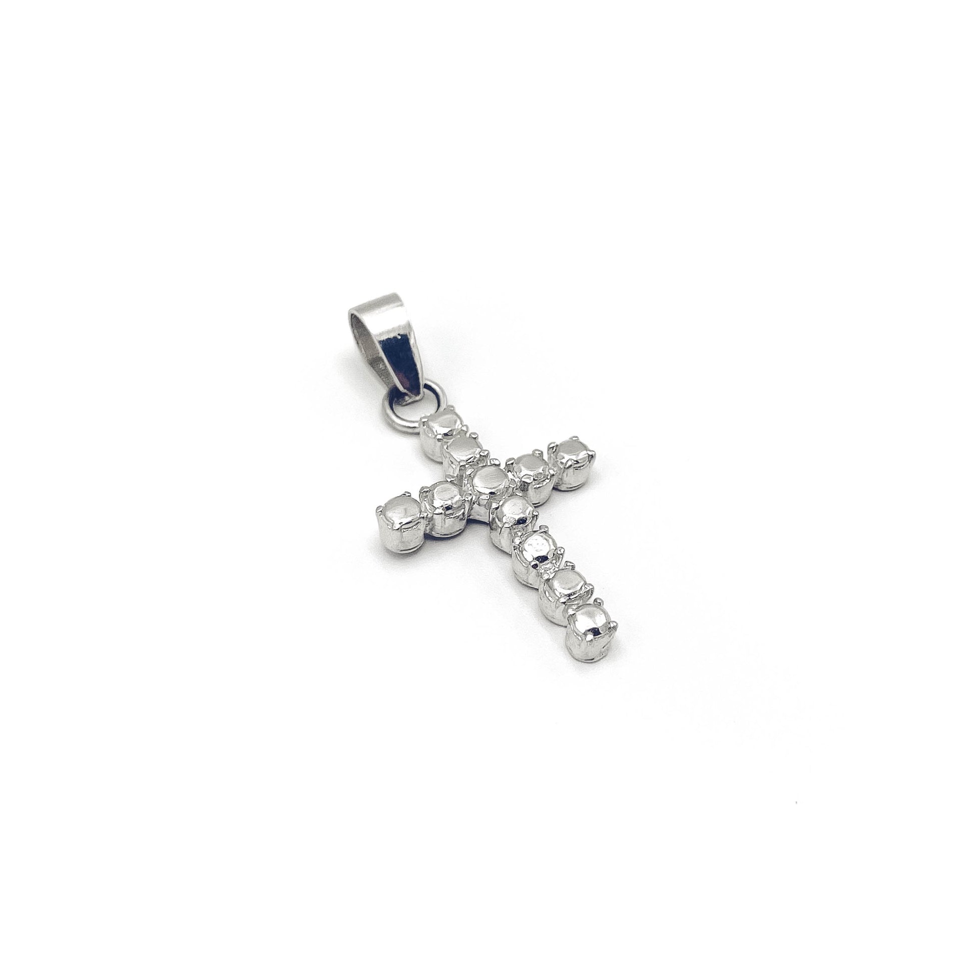 Sterling silver cross pendant with stone detail .