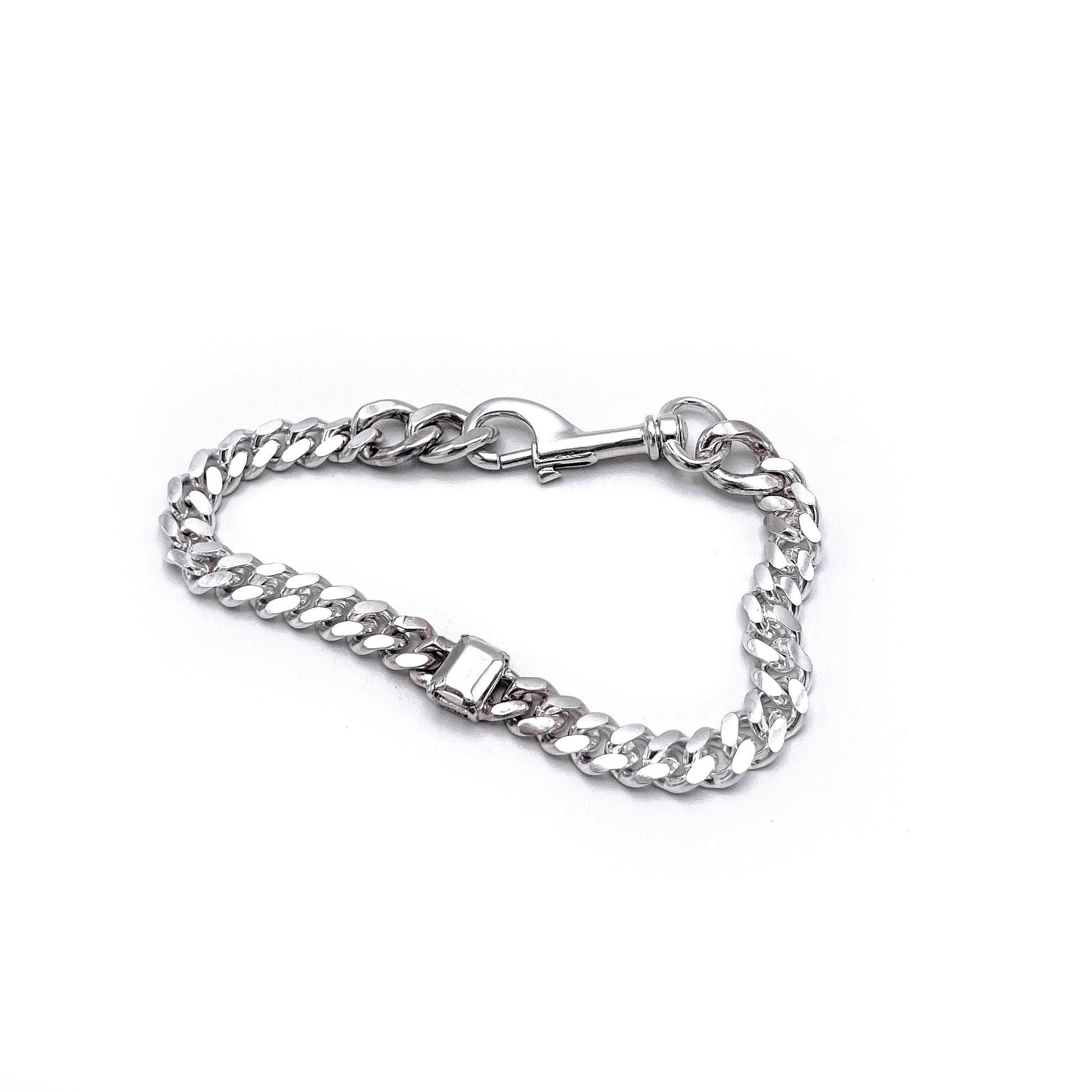Thin link bracelet with silver stone accents . flats