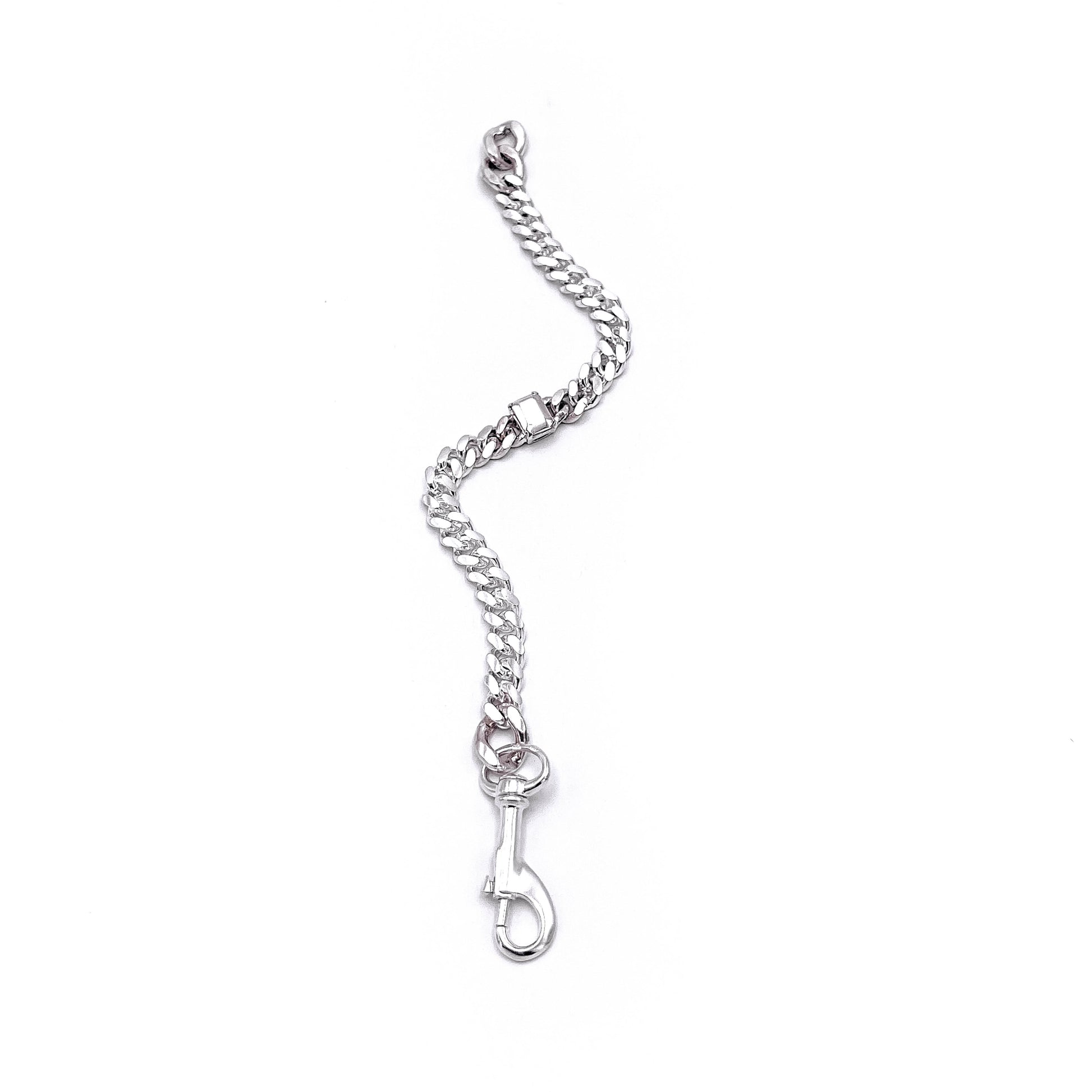 Thin link bracelet with silver stone accents. flat open