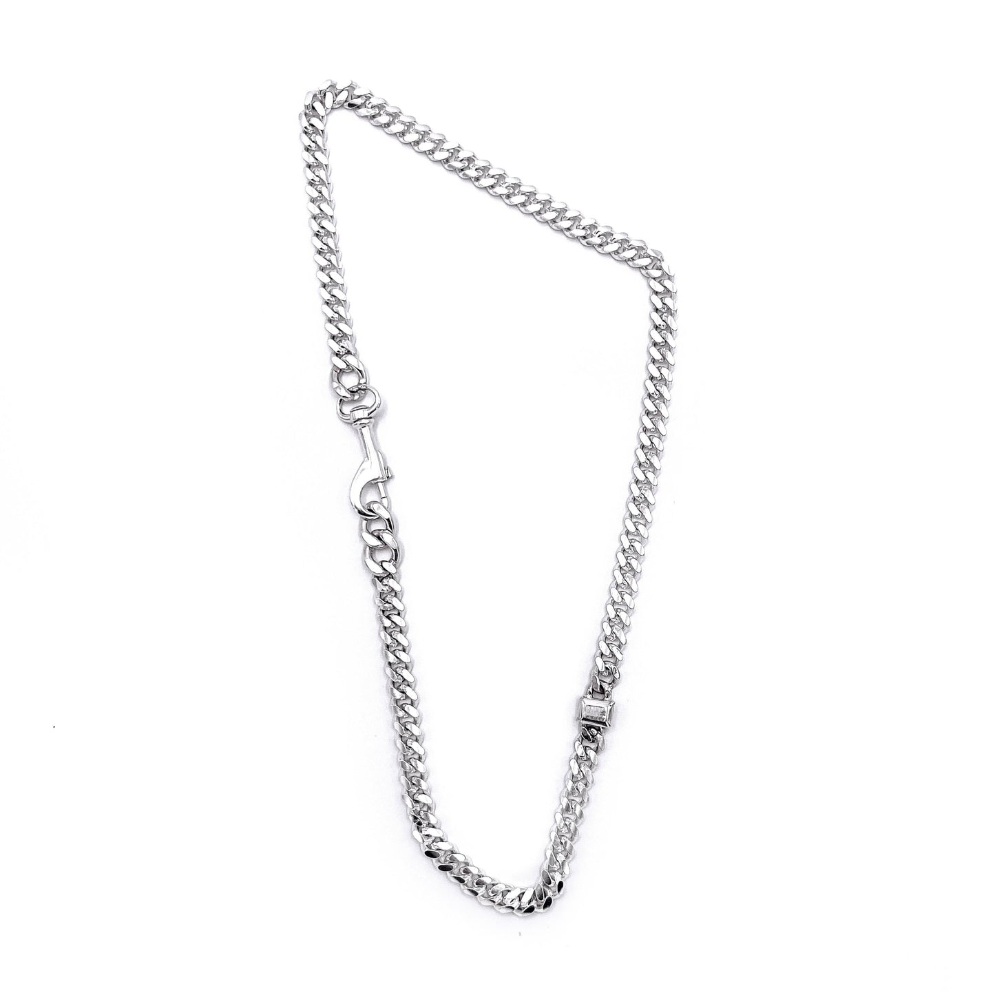 Thin link bracelet with silver stone accents .