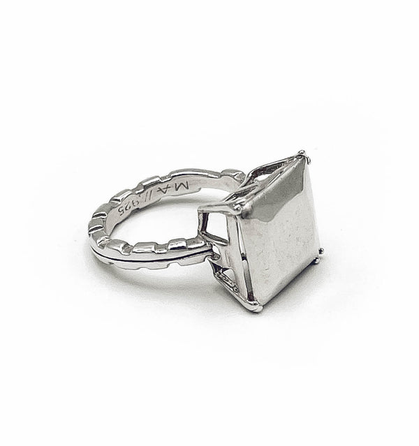 Modern square-cut gemstone ring in sterling silver . flat