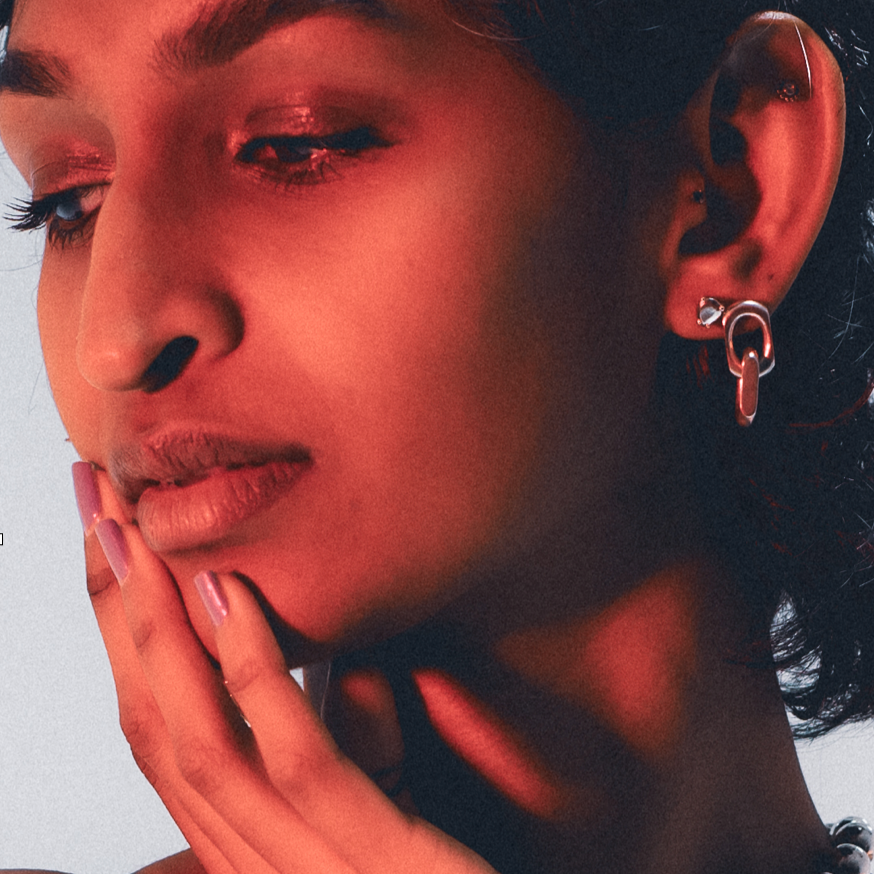 Classic teardrop-shaped stud earrings in sterling silver .