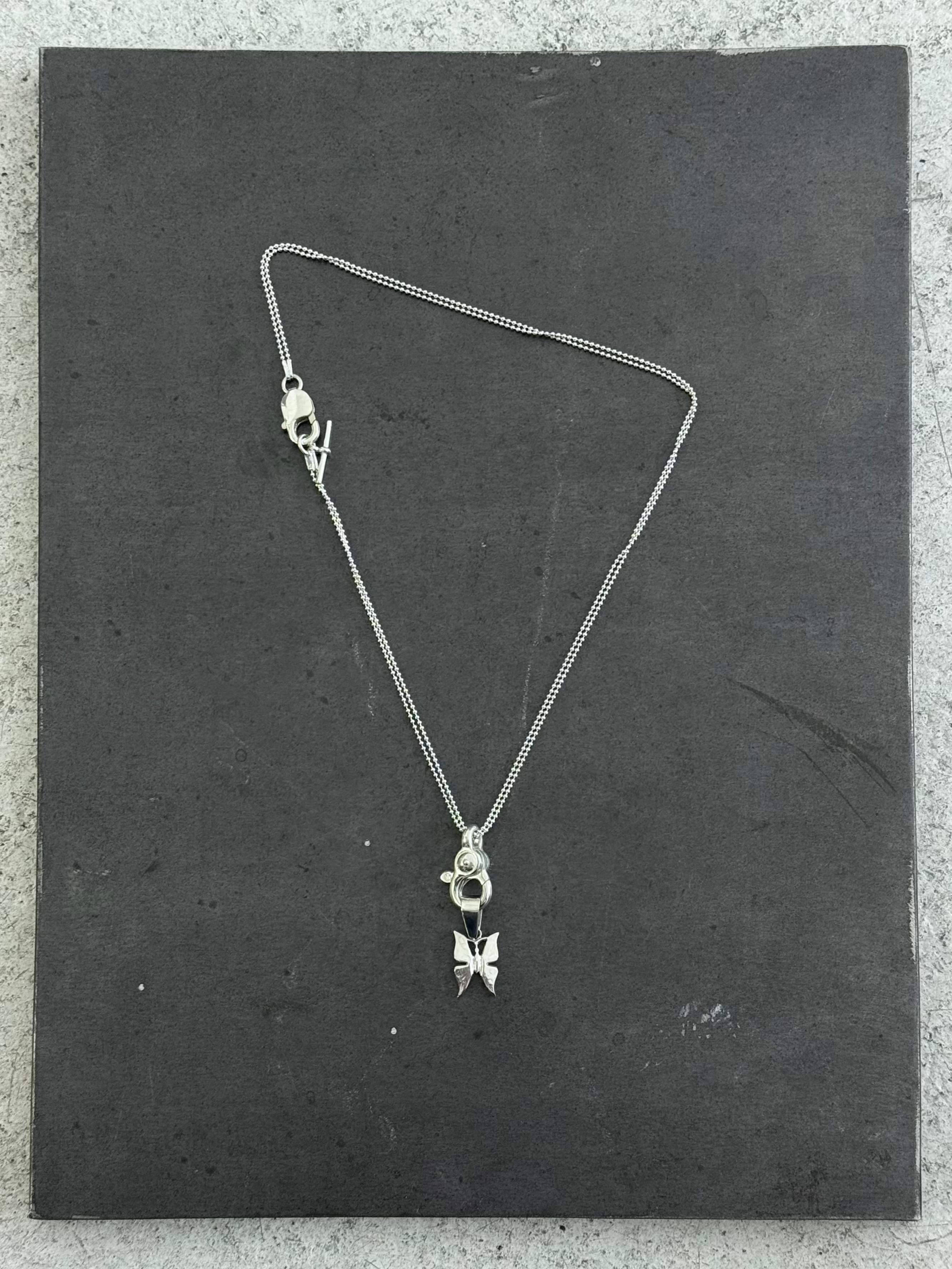 TRIGGER ATTACHMENT CHAIN