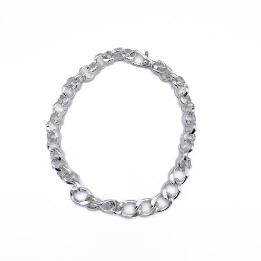 Heirloom silver finish over chunky chain links .